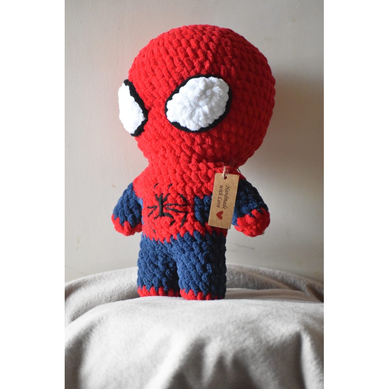 Handmade crochet Spider-Man inspired plush toy amigurumi crafted with red and blue plush yarn