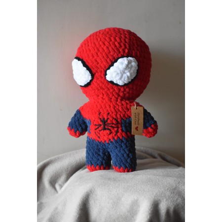 Handmade red and blue crochet Spider-Man amigurumi plushie by cuddling crochet